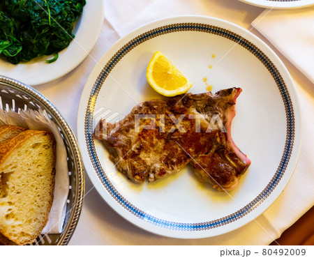 Italian dish - traditional veal chop with lemon Italian dish - traditional veal chop with lemon 80492009