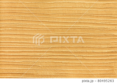 Texture of yellow stucco wall, decorative orange plaster with horizontal lines, gold background 80495263