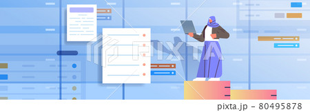 arab businesswoman working on laptop business planning multitasking time management concept 80495878