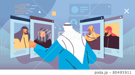 arab hr manager choosing resume curriculum vitae with photo and personal info of new employees job candidates arab hr manager choosing resume curriculum vitae with photo and personal info of new employees job candidates 80495911