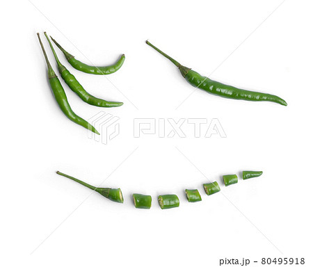 Chili peppers with sliced green chili peppers isolated on white background. Hot and spicy food. Vegetable. Seasoning ingredient. 80495918