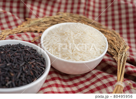 Paddy rice with black riceberry rice isolated on white background. Organic. Raw, wheat or grain. Agriculture. Food. 80495956