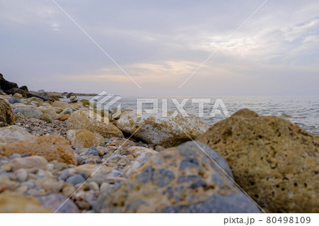 Magical sunset background natural colours crashing wave Cyprus landscape beach sea stone . High quality photo 80498109