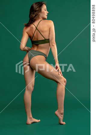 Back view of perfect slim body. Full length portrait. Young woman with her natural healthy skin. Back view of perfect slim body. Full length portrait. Young woman with her natural healthy skin. 80498898