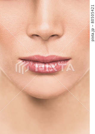 Lips beauty woman closeup of plum healthy mouth for lip injection fillers. Lipstick, lip gloss, makeup concept 80505421