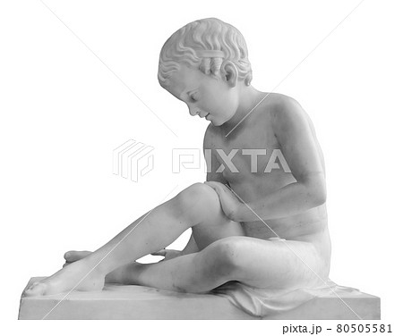 Ancient marble statue of a sitting boy. Young man sculpture isolated on white background. Antique stone monument Ancient marble statue of a sitting boy. Young man sculpture isolated on white background. Antique stone monument 80505581