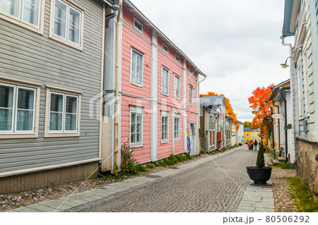Porvoo, Finland - 2 October 2019: Street of Old Porvoo, Finland. Beautiful city autumn landscape with colorful wooden buildings. 80506292