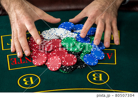 Poker play. Chips and cards Poker play. Chips and cards 80507304