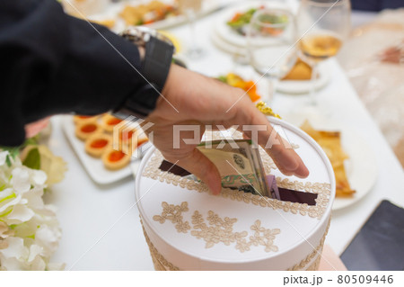 Money in hand. A person recounts money - Russian rubles. Money in hand. A person recounts money - Russian rubles. 80509446