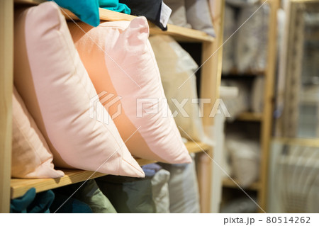 Pillows for sale on shelving in home furnishings store Pillows for sale on shelving in home furnishings store 80514262
