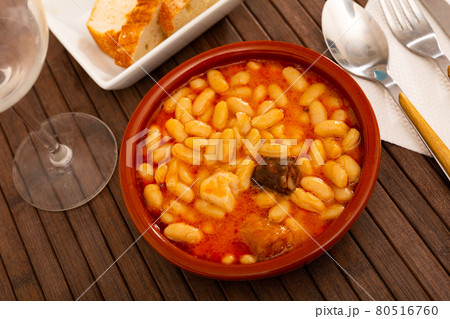 Tasty stew of asturian beans in gravy with sausages 80516760