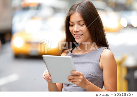 Tablet computer businesswoman in New York City Tablet computer businesswoman in New York City 80518857