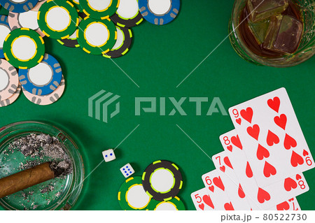 Set to playing poker with cards and chips on green background 80522730