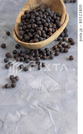 Wooden bowl of black chickpea closeup Wooden bowl of black chickpea closeup 80523800
