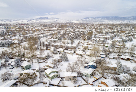 residential neighborhood in winter scenery - aerial view 80533737