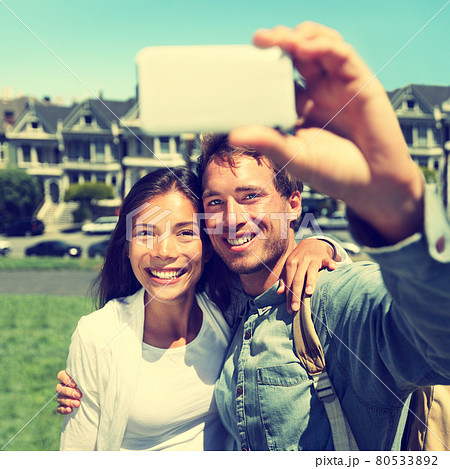 Selfie - Couple taking photo in San Francisco 80533892