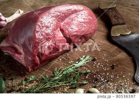 Juicy raw beef steak on wooden table 80536397