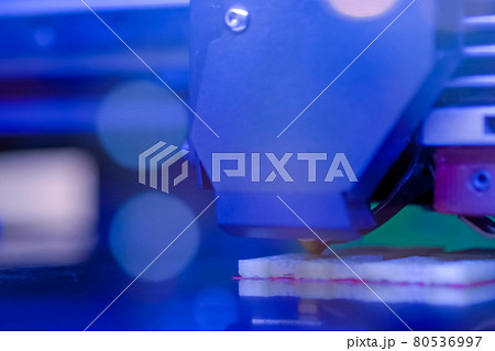 Three dimensional printing machine prints physical 3D model - close up Three dimensional printing machine prints physical 3D model - close up 80536997