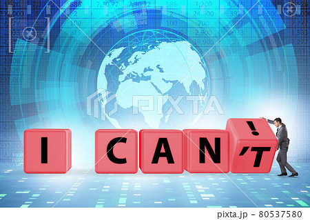 Determination concept with rotating cubes and businessman 80537580