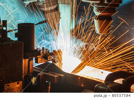 robots welding in a car factory 80537584