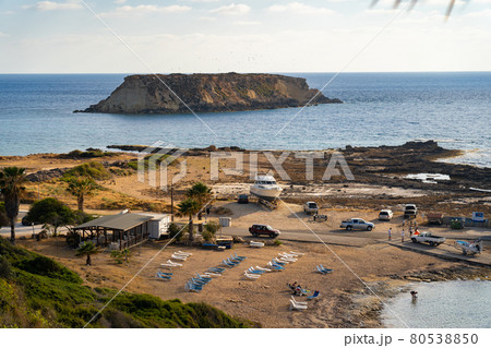 Cyprus beautiful scenic view Agios Georgios island in evening at sunset . Akamas. Agios Georgios church and harbor, Akamas, Paphos, Cyprus Cyprus beautiful scenic view Agios Georgios island in evening at sunset . Akamas. Agios Georgios church and harbor, Akamas, Paphos, Cyprus 80538850