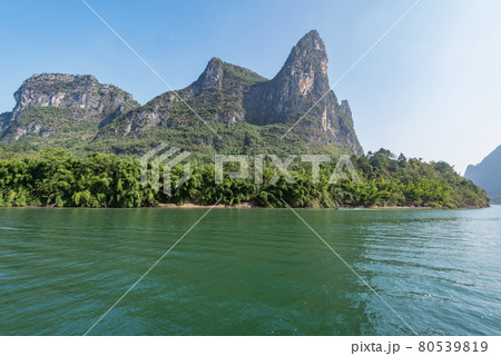 Day view of karst hills by Li River. China. Day view of karst hills by Li River. China. 80539819