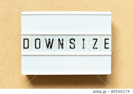 Lightbox with word downsize on wood background Lightbox with word downsize on wood background 80540174