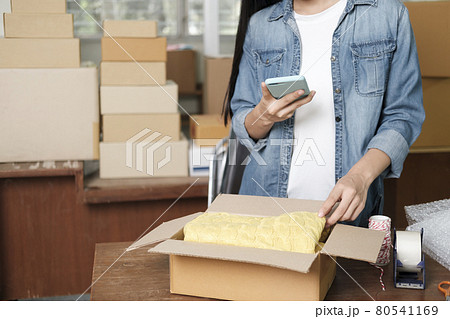 Online business owner preparing product to customer. 80541169