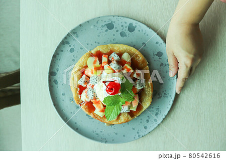 naan or roti, deep fried naan with fruit and ice cream naan or roti, deep fried naan with fruit and ice cream 80542616