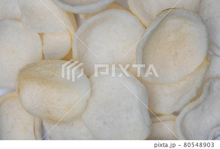 Crabbread chips on a white surface Crabbread chips on a white surface 80548903