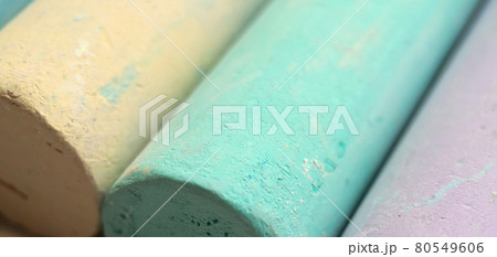 Close-up texture of chalk for drawing multicolored green, blue, yellow, purpleClose-up texture of chalk for drawing multicolored green, blue, yellow, purpleClose-up texture of chalk for drawing 80549606