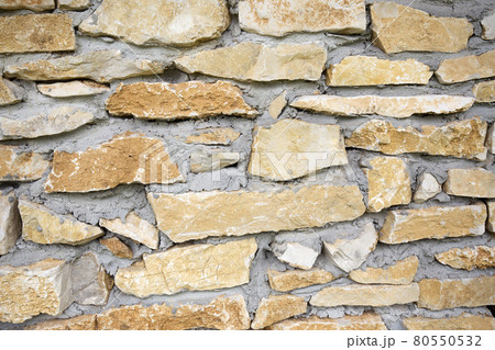 Stone wall a background or texture Stone wall a background or texture 80550532