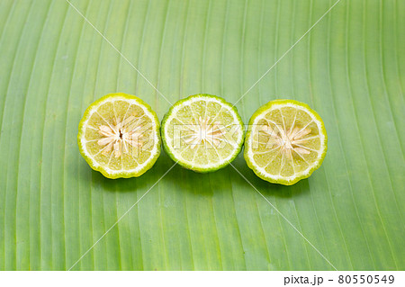 Bergamot kaffir lime herb on banana leaf 80550549
