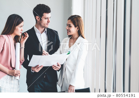 Businessman and businesswomen working in office. 80554191