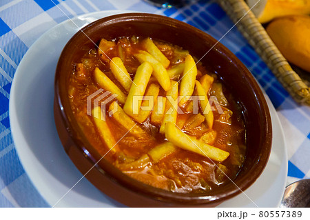 Stewed tripe with potatoes Stewed tripe with potatoes 80557389