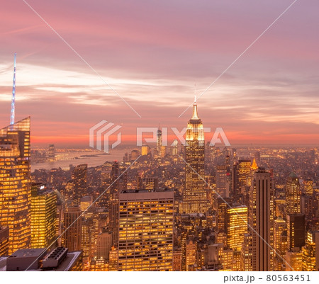 View of New York Manhattan during sunset hours View of New York Manhattan during sunset hours 80563451