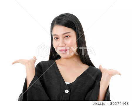 Portrait of smiling woman with hands up isolated on white background. Portrait of smiling woman with hands up isolated on white background. 80574448