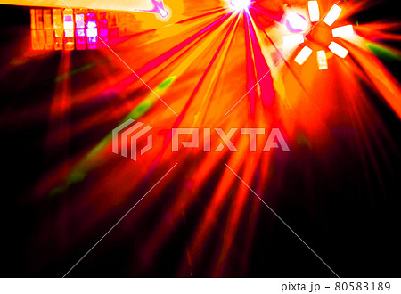 Lighting disco with bright beams of searchlight and laser show. Lighting disco with bright beams of searchlight and laser show. 80583189