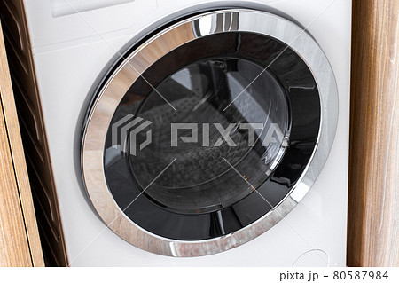Close-Up Washing Machines in Hose, Washing with hot and cold water keeps clothes clean and trendy. 80587984
