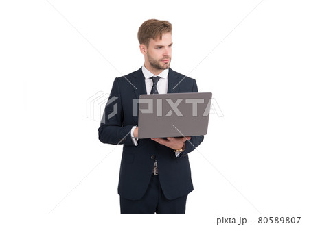 Handsome businessman in formal style suit use computer for running business online, busy Handsome businessman in formal style suit use computer for running business online, busy 80589807