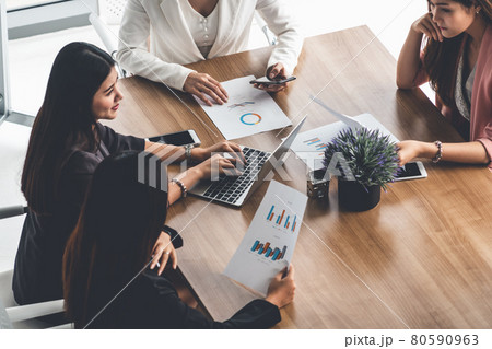 Businesswomen in Meeting, Laptop Computer on Table 80590963