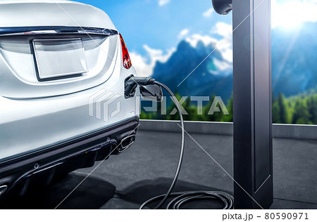 EV charging station for electric car in concept of green energy and eco travel EV charging station for electric car in concept of green energy and eco travel 80590971