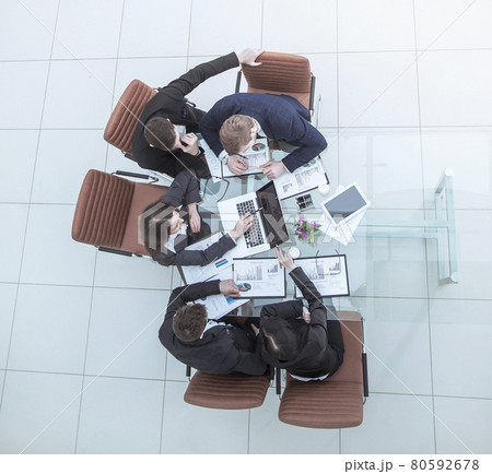 business team discussing the company's financial plan for a modern workplace business team discussing the company's financial plan for a modern workplace 80592678