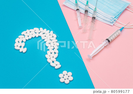 White Question Mark and Syringe. Pharmaceutical Industry and Vaccination White Question Mark and Syringe. Pharmaceutical Industry and Vaccination 80599177