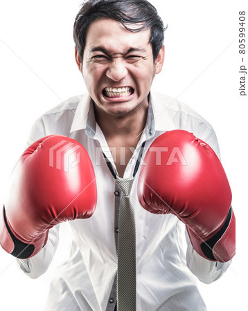 Portrait angry businessman with boxing gloves 80599408