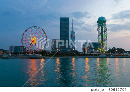 Batumi, Adjara, Georgia. View from the sea on illuminated resort town at evening Batumi, Adjara, Georgia. View from the sea on illuminated resort town at evening 80612795