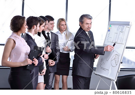 businessman holds a briefing with the business team businessman holds a briefing with the business team 80616835