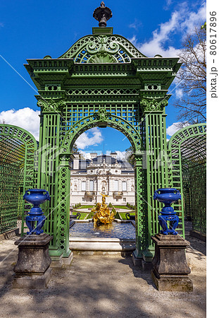 Part of the park with a fountain, arch and sculptures of the Linderhof Palace in Bavaria, Germany 80617896