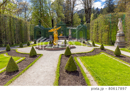 Part of the park with a fountain and sculptures of the Linderhof Palace in Bavaria, Germany Part of the park with a fountain and sculptures of the Linderhof Palace in Bavaria, Germany 80617897