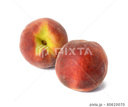 two ripe red peaches isolated on white background 80620070